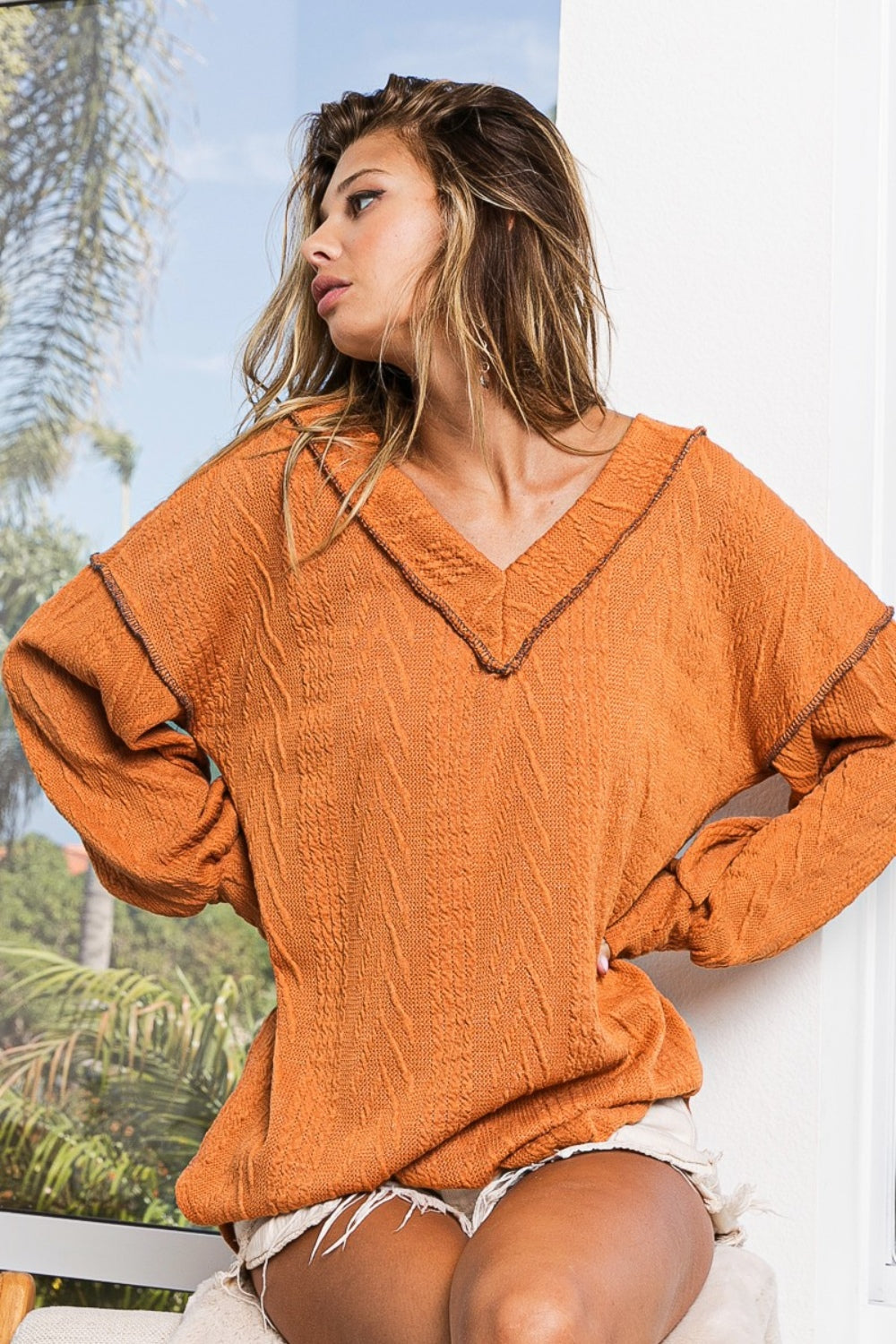 Cielo Exposed Seam Knit Top