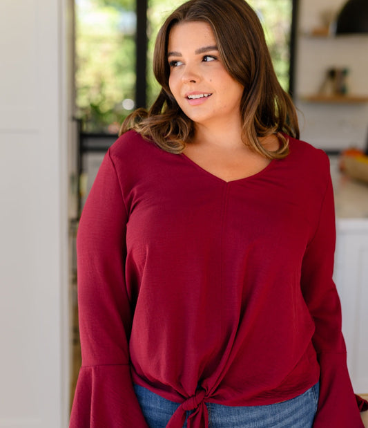 A Flare And A Bow Top