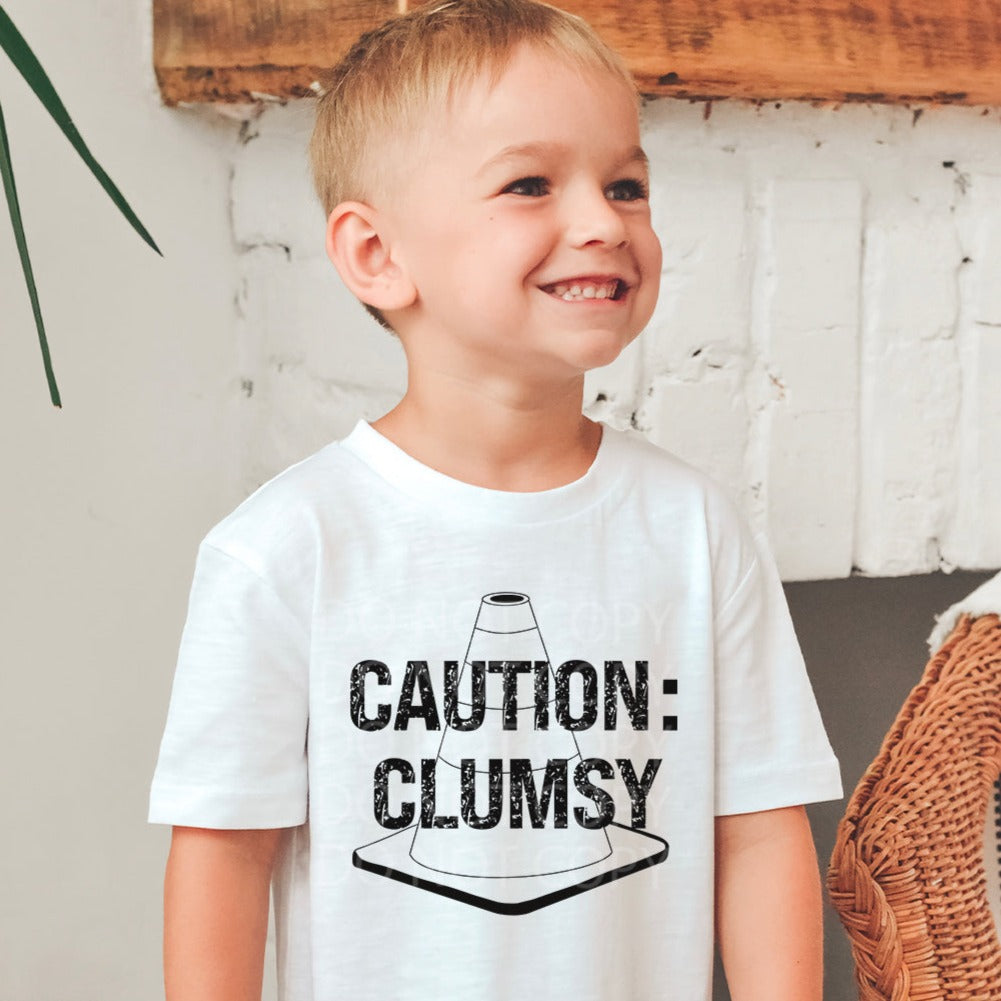Caution: Clumsy Boy Toddler and Youth Tee - Bella Lia Boutique